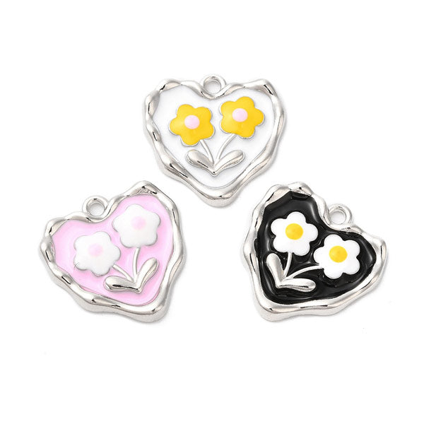 Zilveren hart bedeltjes in roze, wit en zwart. Ideale bedel voor aan een bedelketting of armband.