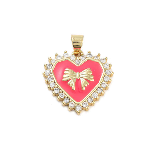 Deze bedel van een goud roze hart met een strik is ideaal voor aan jouw bedelketting of bedelarmband.