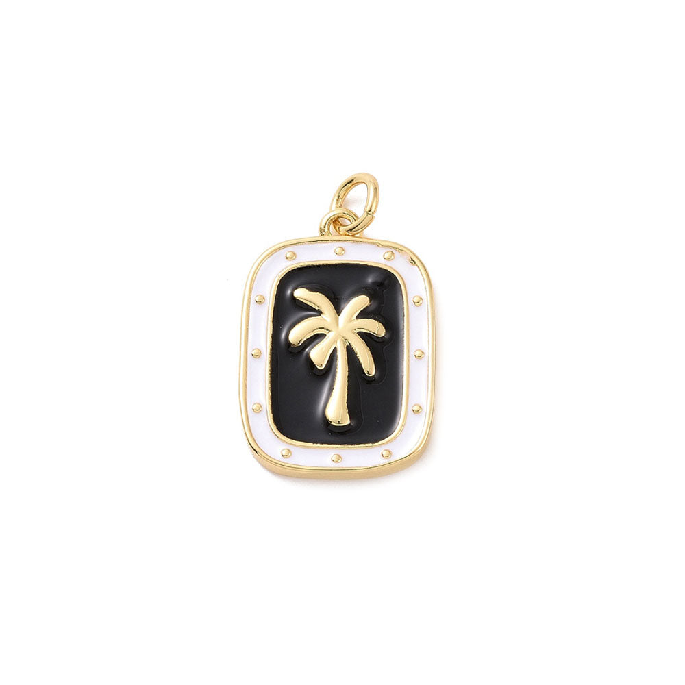 Gouden bedel van een palmboom met zwart en wit enamel. Ideaal voor aan jouw koord ketting of bedelketting.