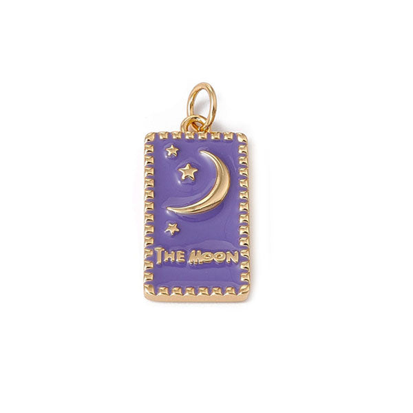 Gouden rechthoekige bedel van een maan met sterretjes en paars enamel. Ideaal voor aan jouw koord ketting of bedelketting.