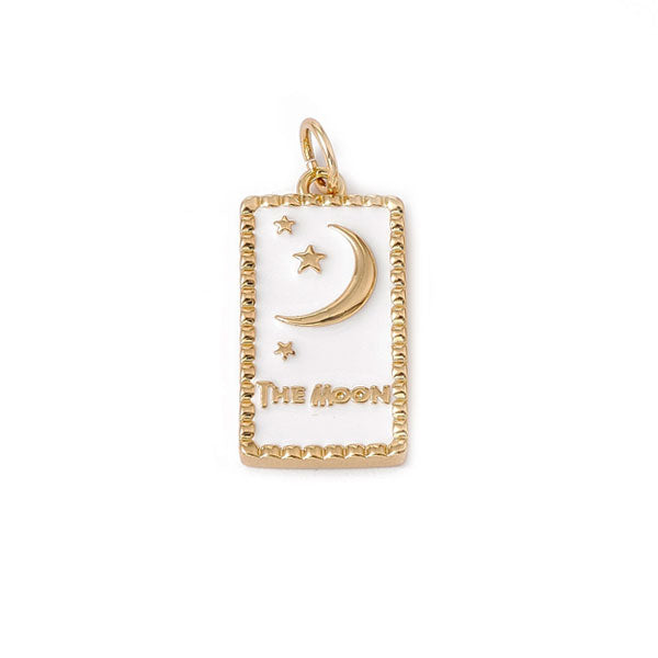 Gouden rechthoekige bedel van een maan met sterretjes en wit enamel. Ideaal voor aan jouw koord ketting of bedelketting.