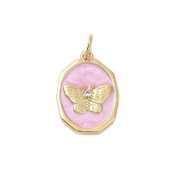 Gouden ovale bedel van een vlinder met roze enamel. Ideaal voor aan jouw koord ketting of bedelketting.