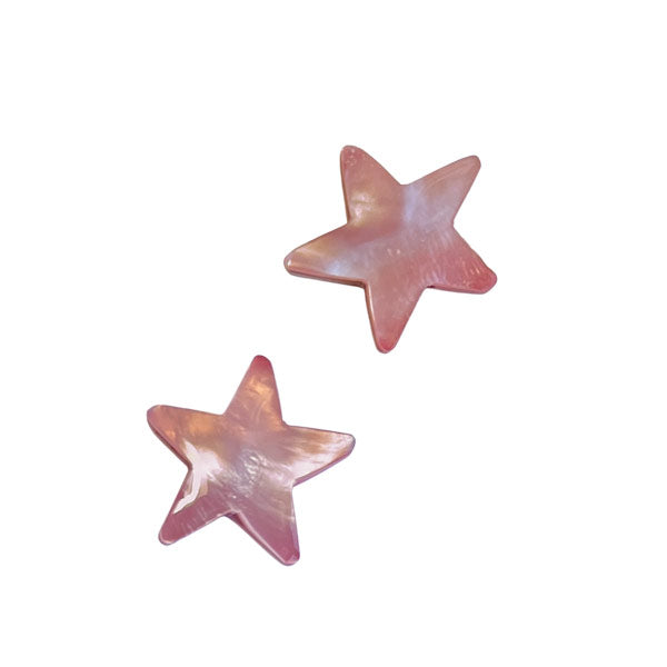 glanzende roze kralen van schelp in de vorm van een ster