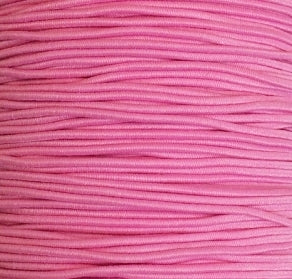 rol met roze gekleurd elastiek om armbandjes mee te maken